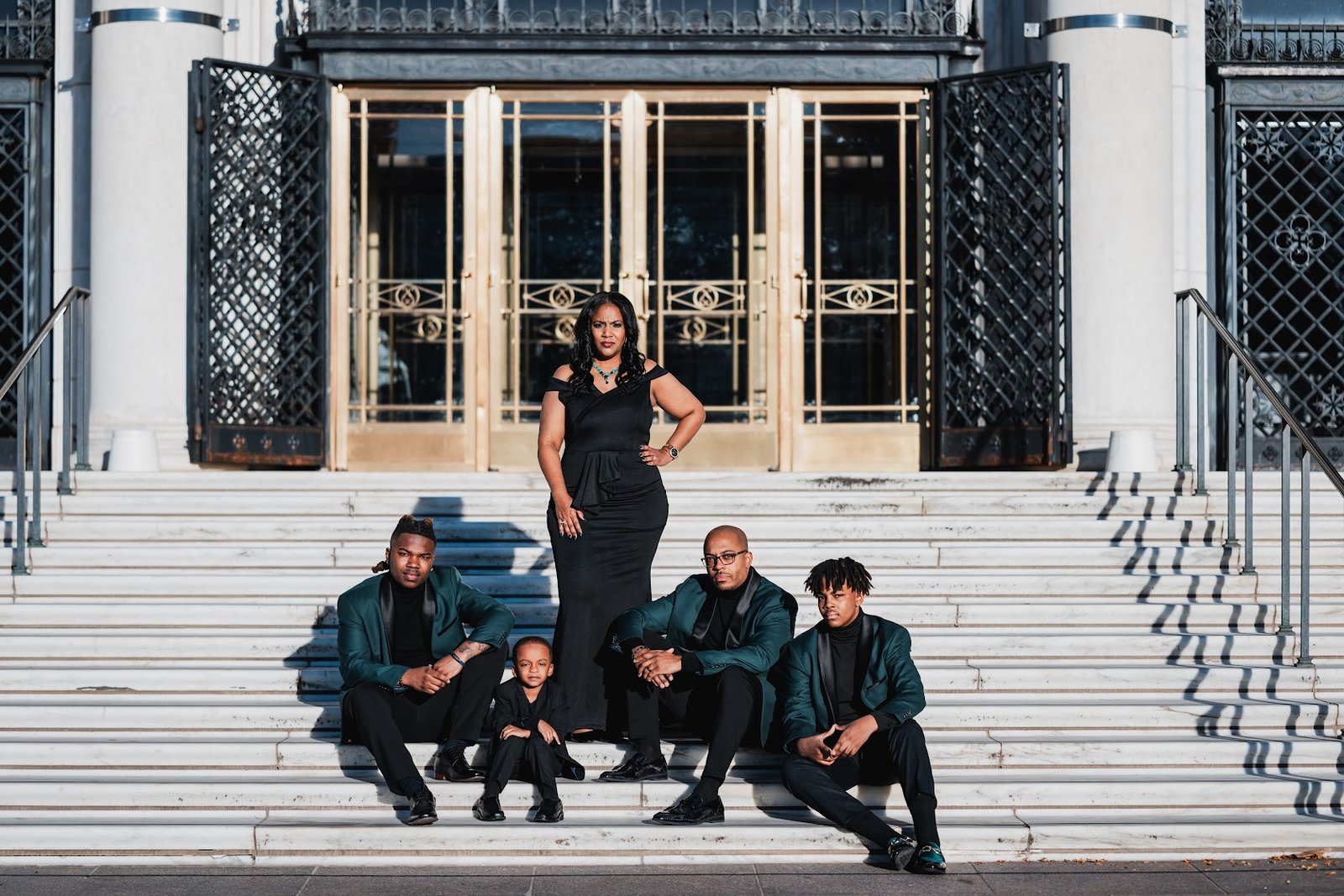 Raquel Ne’Cole with her family on the steps of a Detroit landmark